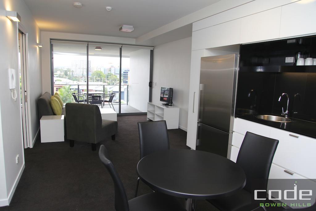Code Apartamentos Brisbane Habitación foto