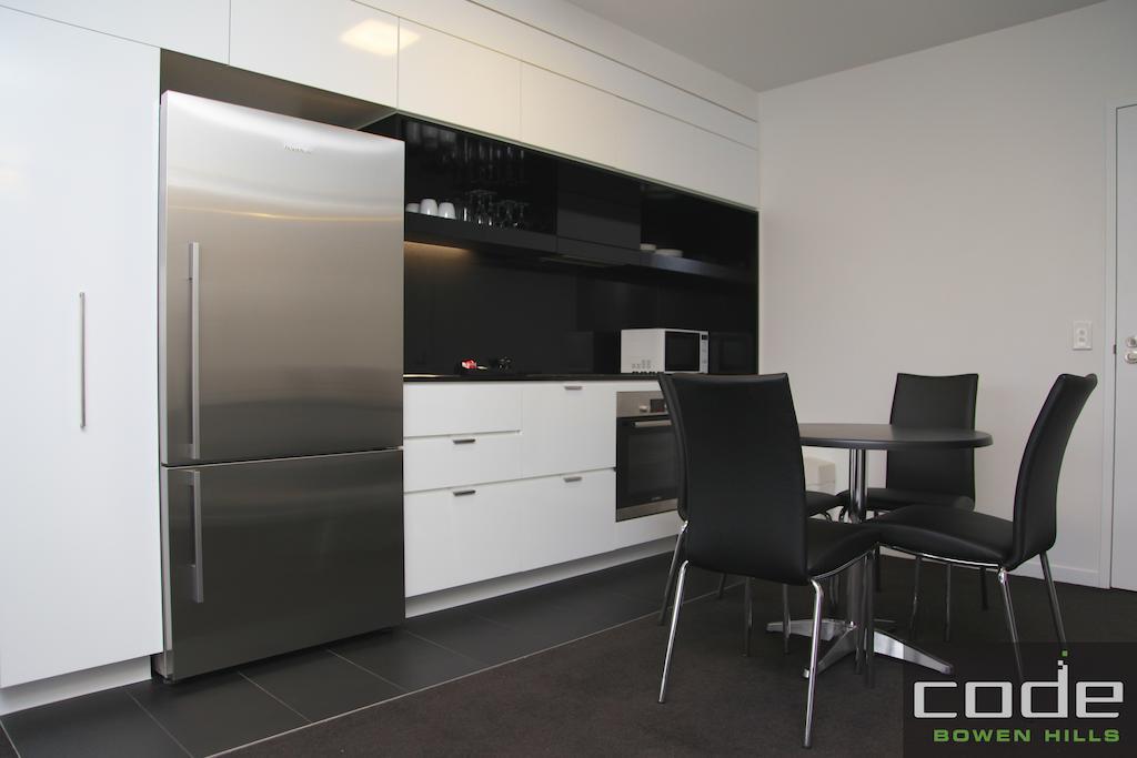 Code Apartamentos Brisbane Habitación foto